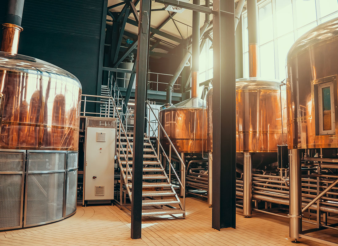 Insurance by Industry - View of Brewing and Beer Fermentation Equipment Inside a Modern Brewing Facility
